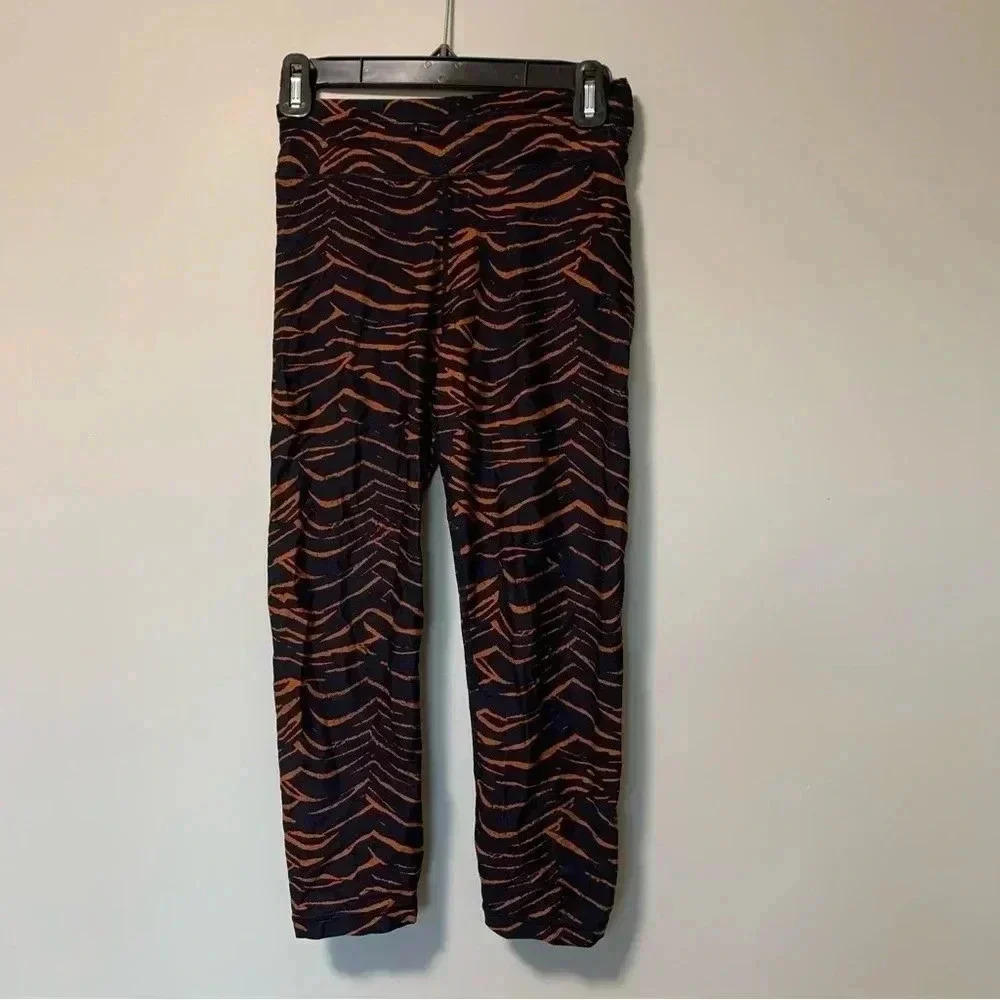 The Upside navy  orange tiger leggings